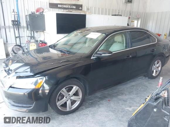2012 Volkswagen Passat SE with VIN 1VWBP7A31CC049830, listed as a IAAI auction lot 42578197 with 239,426 mi miles and . Bid and sale history available at DreamBid. Image 2.