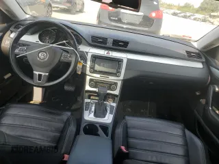 2009 Volkswagen CC Luxury with VIN WVWHL73C19E514531, listed as a Copart auction lot 71124304 with 120,483 mi miles and Salvage Title. Bid and sale history available at DreamBid. Image 8.