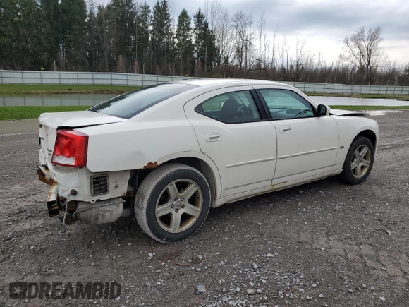 2010 Dodge Charger SXT with VIN 2B3CA3CV1AH188187, listed as a Copart auction lot 53887565 with 151,635 mi miles and Salvage Title. Bid and sale history available at carsss.com. Image 3.