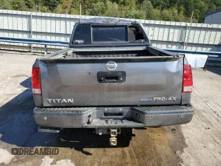 2015 Nissan Titan SL with VIN 1N6BA0EC5FN509230, listed as a Copart auction lot 73983574 with 144,288 mi miles and Salvage Title. Bid and sale history available at carsss.com. Image 6.