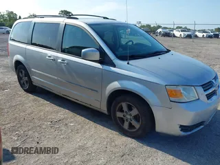 2009 Dodge Grand Caravan SXT z VIN 2D8HN54189R671683, wystawiony jako IAAI lot #42350455 z przebiegiem 220 306 mil mil oraz . Historia ofert i sprzedaży dostępna na DreamBid. Obrazek 1.