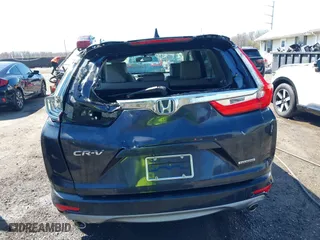 2019 Honda CR-V Touring with VIN 2HKRW1H96KH505447, listed as a IAAI auction lot 41876110 with 56,104 mi miles. Bid and sale history available at carsss.com. Image 6.