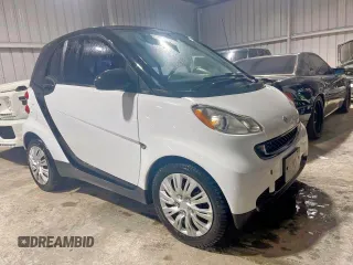 2012 Smart fortwo Pure with VIN WMEEJ3BA5CK540092, listed as a Copart auction lot 62614655 with 59,356 mi miles and Salvage title. Bid and sale history available at DreamBid. Image 1.