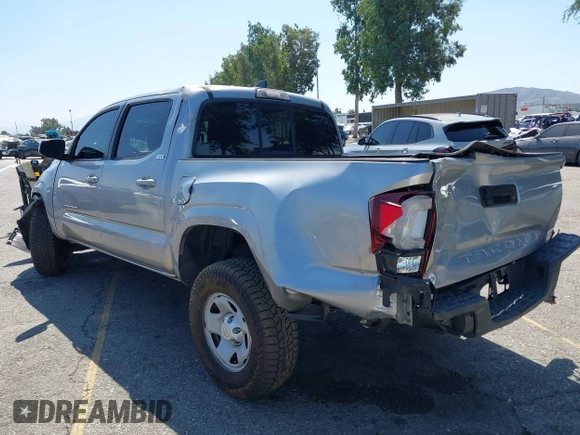 2018 Toyota Tacoma SR with VIN 5TFAX5GN2JX103685, listed as a IAAI auction lot 42392032 with 138,678 mi miles and . Bid and sale history available at DreamBid. Image 3.