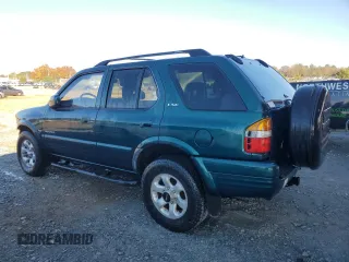 1999 Isuzu Rodeo S с VIN 4S2CK58W6X4352441, выставлен на аукционе Copart как лот 81915384 с пробегом 338 513 миль миль и На запчасти • Non repairable. История ставок и продаж доступна на DreamBid. Изображение 2.
