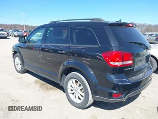 2016 Dodge Journey SXT with VIN 3C4PDCBGXGT123087, listed as a IAAI auction lot 41869667 with 256,583 mi miles. Bid and sale history available at carsss.com. Image 3.