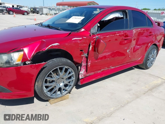 2015 Mitsubishi Lancer GT with VIN JA32U8FW9FU014308, listed as a IAAI auction lot 41982416 with 227,574 mi miles. Bid and sale history available at carsss.com. Image 6.