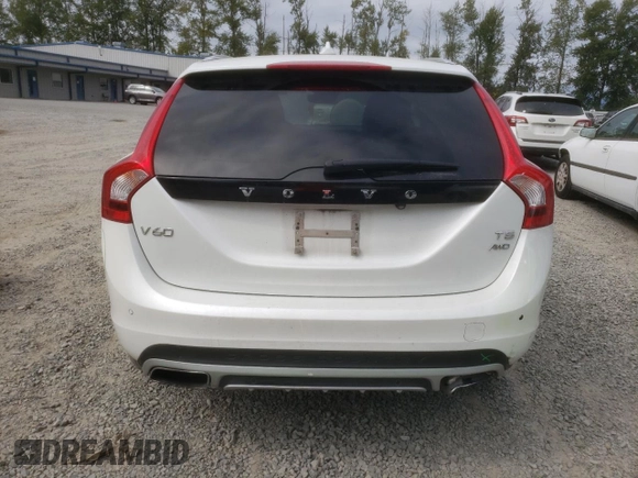 2018 Volvo V60 z VIN YV440MWK1J2051771, wystawiony jako Copart lot #67960674 z przebiegiem 49 782 mil mil oraz Szkoda całkowita • Salvage title. Historia ofert i sprzedaży dostępna na DreamBid. Obrazek 6.