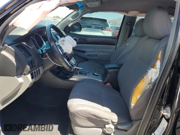 2015 Toyota Tacoma PreRunner with VIN 5TFJU4GN1FX074660, listed as a Copart auction lot 57364995 with 169,185 mi miles and Salvage title. Bid and sale history available at DreamBid. Image 7.