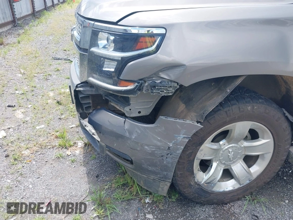 2017 Chevrolet Suburban LT with VIN 1GNSKHKC7HR356677, listed as a IAAI auction lot 42491581 with 129,496 mi miles and . Bid and sale history available at DreamBid. Image 17.
