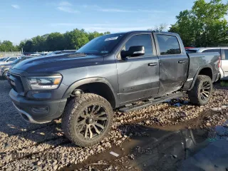 2019 Ram 1500 Rebel with VIN 1C6SRFLT2KN565015, listed as a Copart auction lot 64234205 with 121,363 mi miles and Salvage title. Bid and sale history available at DreamBid. Image 1.