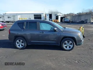2017 Jeep Compass High Altitude with VIN 1C4NJDEB1HD111889, listed as a IAAI auction lot 41509294 with 104,038 mi miles. Bid and sale history available at carsss.com. Image 13.