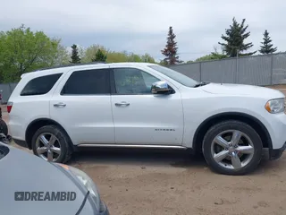 2013 Dodge Durango Citadel z VIN 1C4SDJET7DC512400, wystawiony jako IAAI lot #42246815 z przebiegiem 186 427 mil mil oraz . Historia ofert i sprzedaży dostępna na DreamBid. Obrazek 13.