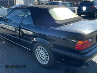 1997 BMW 3-Series 328IC with VIN WBABK8324VET98240, listed as a Copart auction lot 52457785 with 1 mi miles and Clean Title. Bid and sale history available at carsss.com. Image 3.