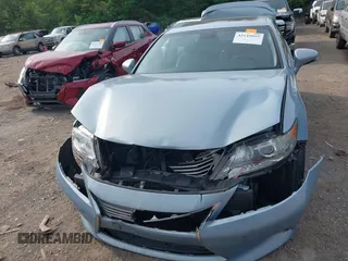 2013 Lexus ES 300h with VIN JTHBW1GG1D2008391, listed as a IAAI auction lot 42145055 with 127,722 mi miles and . Bid and sale history available at DreamBid. Image 6.