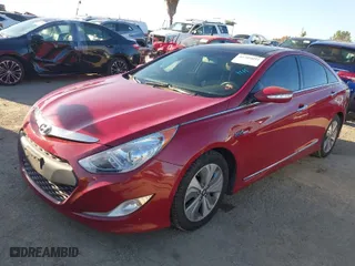 2013 Hyundai Sonata Hybrid Limited with VIN KMHEC4A48DA069570, listed as a IAAI auction lot 41709031 with 173,248 mi miles. Bid and sale history available at carsss.com. Image 2.