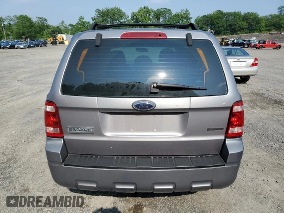 2008 Ford Escape XLS with VIN 1FMCU02Z18KE11979, listed as a Copart auction lot 60212165 with 239,177 mi miles and Salvage title. Bid and sale history available at DreamBid. Image 6.
