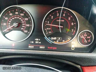 2015 BMW 4 Series 428i with VIN WBA3N7C58FK223993, listed as a IAAI auction lot 40981742 with 89,231 mi miles. Bid and sale history available at carsss.com. Image 7.