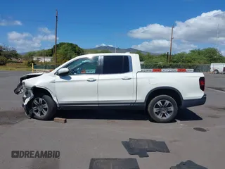 2019 Honda Ridgeline RTL with VIN 5FPYK2F52KB004624, listed as a IAAI auction lot 41789190 with 51,834 mi miles and . Bid and sale history available at DreamBid. Image 14.