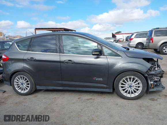 2016 Ford C-Max SEL z VIN 1FADP5CU4GL101968, wystawiony jako IAAI lot #42255922 z przebiegiem 165 358 mil mil oraz . Historia ofert i sprzedaży dostępna na DreamBid. Obrazek 14.