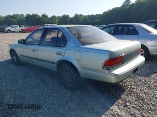 1989 Nissan Maxima z VIN JN1HJ01P5KT267358, wystawiony jako IAAI lot #42283788 z przebiegiem 152 298 mil mil oraz . Historia ofert i sprzedaży dostępna na DreamBid. Obrazek 3.