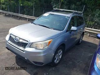2014 Subaru Forester Premium with VIN JF2SJAGC0EH473208, listed as a IAAI auction lot 42800673 with 186,698 mi miles and . Bid and sale history available at DreamBid. Image 2.