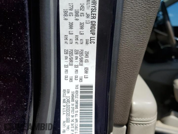 2013 Dodge Durango Crew z VIN 1C4RDJDG5DC651668, wystawiony jako Copart lot #57346645 z przebiegiem 164 987 mil mil oraz Szkoda całkowita • Salvage title. Historia ofert i sprzedaży dostępna na DreamBid. Obrazek 13.