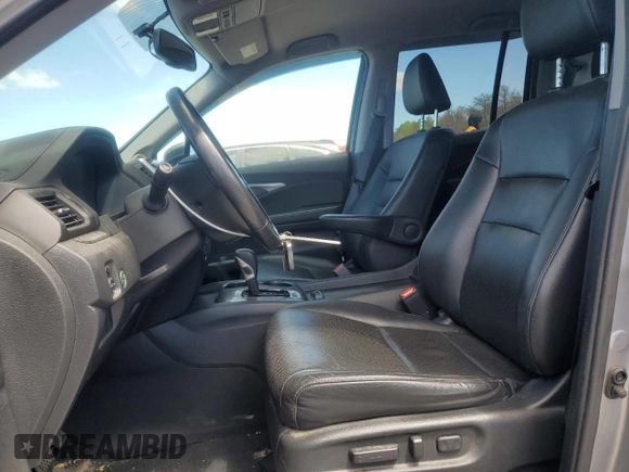 2017 Honda Ridgeline RTL-T with VIN 5FPYK3F65HB012868, listed as a Copart auction lot 57562885 with 115,530 mi miles and Salvage title. Bid and sale history available at DreamBid. Image 7.