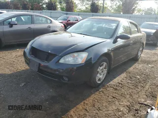 2002 Nissan Altima S z VIN 1N4AL11D12C140391, wystawiony jako Copart lot #59108005 z przebiegiem 214 355 mil mil oraz Szkoda całkowita • Salvage title. Historia ofert i sprzedaży dostępna na DreamBid. Obrazek 1.
