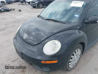 2010 Volkswagen New Beetle Coupe with VIN 3VWPG3AG9AM015051, listed as a IAAI auction lot 42052771 with 163,728 mi miles. Bid and sale history available at carsss.com. Image 6.