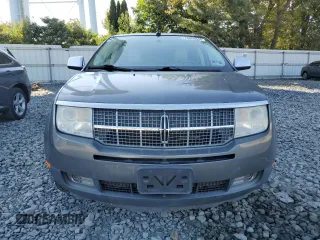 2009 Lincoln MKX with VIN 2LMDU88C69BJ13322, listed as a Copart auction lot 70686844 with 129,384 mi miles and Salvage Title. Bid and sale history available at carsss.com. Image 5.