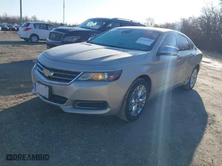2015 Chevrolet Impala LT with VIN 2G1125S31F9128225, listed as a IAAI auction lot 41728544 with 127,636 mi miles. Bid and sale history available at carsss.com. Image 18.