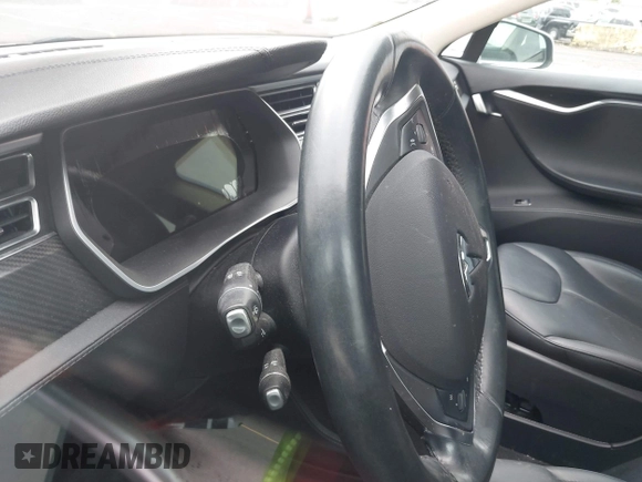 2014 Tesla Model S 60 with VIN 5YJSA1S13EFP53662, listed as a IAAI auction lot 42249930 with Not provided miles and . Bid and sale history available at DreamBid. Image 16.