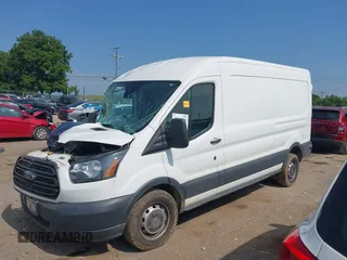 2016 Ford Transit Cargo z VIN 1FTYR2CM6GKA55411, wystawiony jako IAAI lot #42582896 z przebiegiem 89 921 mil mil oraz . Historia ofert i sprzedaży dostępna na DreamBid. Obrazek 14.