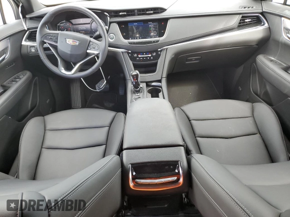 2024 Cadillac XT6 FWD Luxury with VIN 1GYKPAR4XRZ746989, listed as a Copart auction lot 77325614 with 2,234 mi miles and Salvage Title. Bid and sale history available at carsss.com. Image 8.