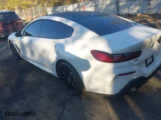 2023 BMW 8 Series M850i with VIN WBAGV8C0XPCL58173, listed as a IAAI auction lot 41693747 with 24,954 mi miles. Bid and sale history available at carsss.com. Image 3.