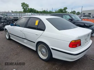 2000 BMW 5 Series 528i z VIN WBADM6341YGU07316, wystawiony jako IAAI lot #42436386 z przebiegiem Nie podano mil oraz . Historia ofert i sprzedaży dostępna na DreamBid. Obrazek 3.