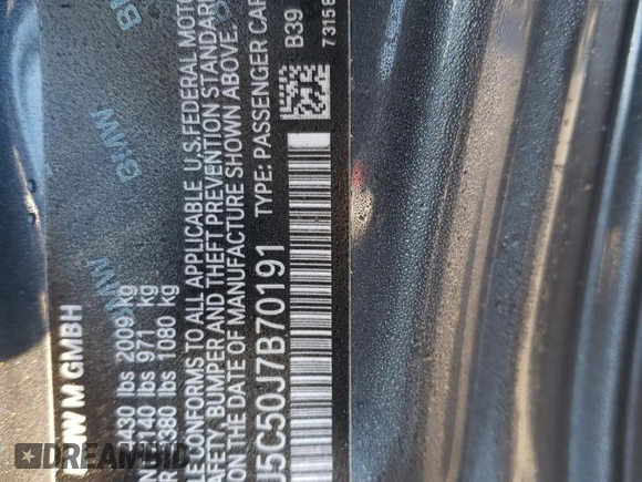 2018 BMW M2 z VIN WBS1J5C50J7B70191, wystawiony jako Copart lot #86976284 z przebiegiem Nie podano mil oraz Szkoda całkowita • Salvage title. Historia ofert i sprzedaży dostępna na DreamBid. Obrazek 14.