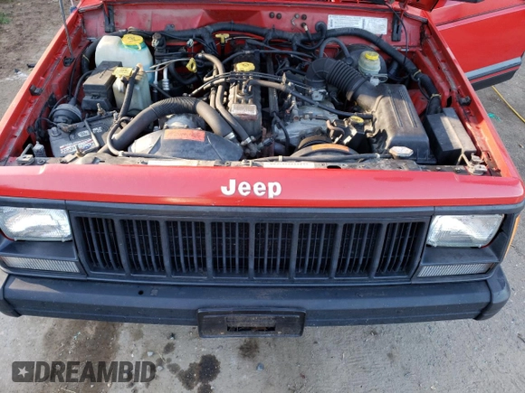 1996 Jeep Cherokee Sport with VIN 1J4FJ68S8TL285995, listed as a Copart auction lot 73333574 with 187,429 mi miles and Salvage Title. Bid and sale history available at carsss.com. Image 12.