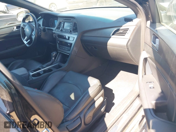 2015 Hyundai Sonata Sport z VIN 5NPE34AB5FH198560, wystawiony jako IAAI lot #42467031 z przebiegiem 96 111 mil mil oraz . Historia ofert i sprzedaży dostępna na DreamBid. Obrazek 5.