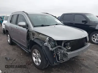 2016 Jeep Compass Latitude with VIN 1C4NJCEA2GD719694, listed as a IAAI auction lot 41508771 with 121,469 mi miles. Bid and sale history available at carsss.com. Image 1.