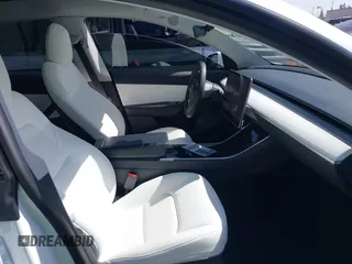 2021 Tesla Model Y Long Range with VIN 5YJYGDEE3MF081304, listed as a IAAI auction lot 41706240 with 90,510 mi miles and . Bid and sale history available at DreamBid. Image 5.