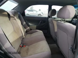 1996 Mazda 626 z VIN 1YVGE22C2T5585359, wystawiony jako Copart lot #74568444 z przebiegiem 159 922 mil mil oraz Szkody całkowita. Historia ofert i sprzedaży dostępna na DreamBid. Obrazek 11.