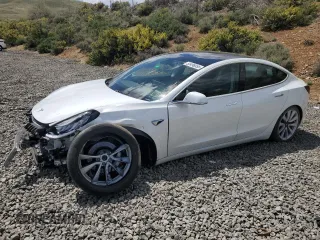 2020 Tesla Model 3 Long Range with VIN 5YJ3E1EB0LF512250, listed as a Copart auction lot 55496055 with 74,803 mi miles and Clean Title. Bid and sale history available at carsss.com. Image 1.