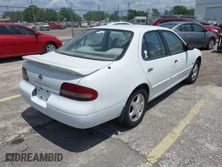 1997 Nissan Altima XE with VIN 1N4BU31DXVC258666, listed as a IAAI auction lot 42075795 with 122,199 mi miles. Bid and sale history available at carsss.com. Image 4.