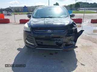 2013 Ford Escape SEL with VIN 1FMCU9HX1DUB97939, listed as a IAAI auction lot 42293561 with 196,951 mi miles and . Bid and sale history available at DreamBid. Image 13.