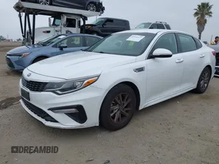 2019 Kia Optima LX with VIN 5XXGT4L35KG324274, listed as a IAAI auction lot 42111177 with 126,494 mi miles. Bid and sale history available at carsss.com. Image 17.