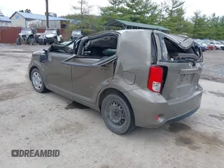 2014 Scion xB with VIN JTLZE4FE9EJ050596, listed as a IAAI auction lot 41884572 with 141,896 mi miles. Bid and sale history available at carsss.com. Image 3.