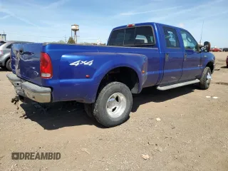 2003 Ford F-350 XL with VIN 1FTWW33P53EB90677, listed as a Copart auction lot 56300685 with 174,091 mi miles and Salvage title. Bid and sale history available at DreamBid. Image 3.