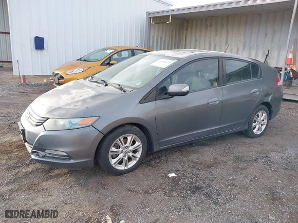 2011 Honda Insight EX with VIN JHMZE2H75BS006078, listed as a IAAI auction lot 41755652 with 209,774 mi miles. Bid and sale history available at carsss.com. Image 2.